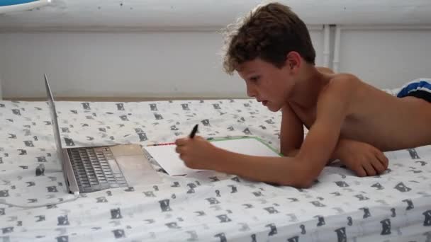 Young Boy Studying Home Front Laptop Child Doing Homework Lying — Wideo stockowe