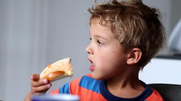 Little Boy Taking Bite Bread Jelly Morning Breakfast Table — Video