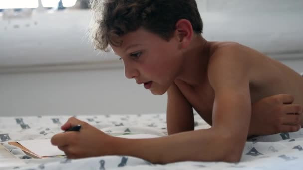 Candid Child Doing Homework Young Boy Studying Home Lockdown — Vídeo de stock
