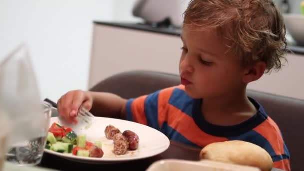 Toddler Boy Eating Dinner Child Eats Supper — Stockvideo