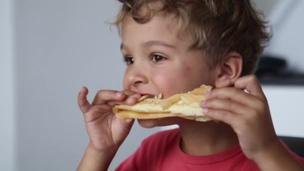 Pensive Child Eating Pancake Morning Breakfast — ストック動画