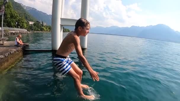 Child Running Jumping Lake Water Young Boy Splashing Fresh Water — Stok video