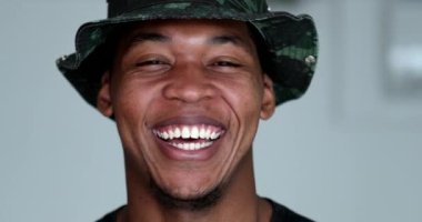 Happy African American young man smiling portrait