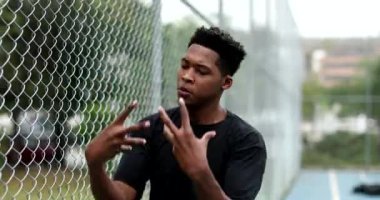 Black man krumping outside. african urban dancer