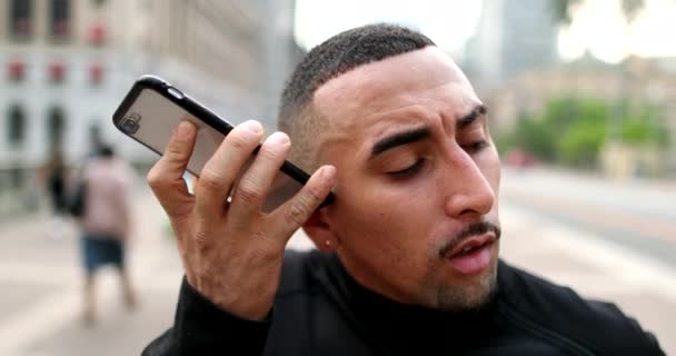 Hispanic Latin Man Listening Cellphone Audio Receiving Shocking News — Vídeos de Stock