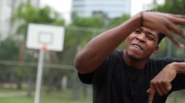 Black African man performing urban dance freestyle krump