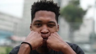 Black African man performing urban dance freestyle krump