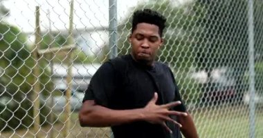 Black man krumping outside. african urban dancer