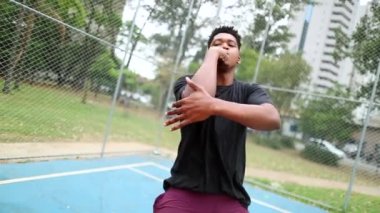Black African man performing urban dance freestyle krump