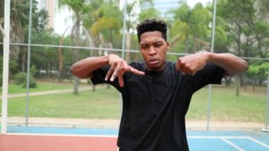 Black African man performing urban dance freestyle krump