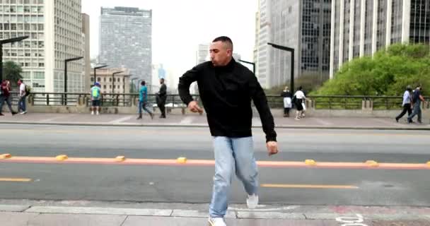 Happy Hispanic Man Dancing Downtown City Street — Video Stock