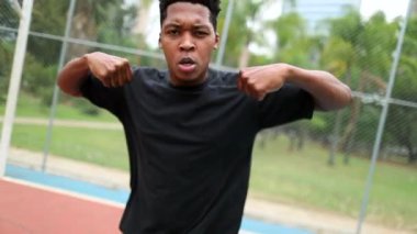Black African man performing urban dance freestyle krump