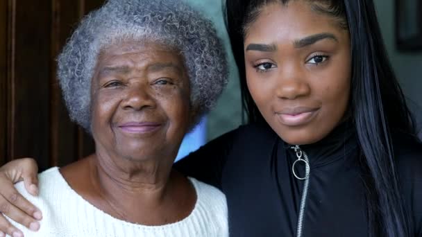 Teen Granddaughter Embracing Grandmother Black Girl Embraces Grandparent — Stock Video