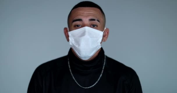 Hispanic Latino Young Man Adjusting Face Mask — Stok video