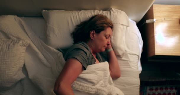 Older Woman Turning Nightstand Light Getting Out Bed Middle Night — Video Stock