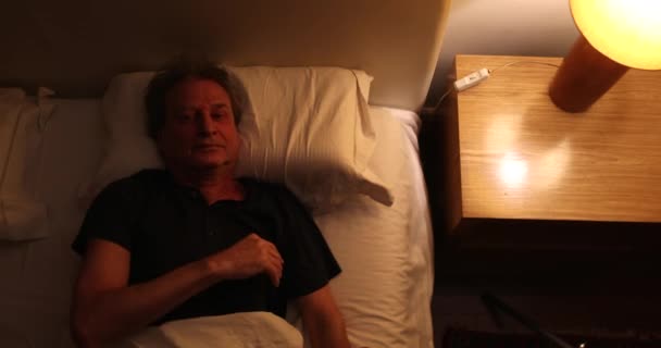 Person Turns Nightstand Light Going Sleep — Wideo stockowe