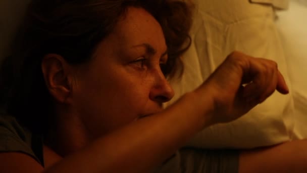 Woman Turning Bedside Lamp — Stock videók
