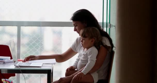 Mother Multi Tasking Home Infant Toddler Boy Watching Cartoon Laptop — Stockvideo