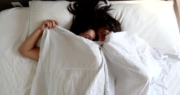 Fun Loving Young Married Couple Hiding Blanket Bed Top View — Wideo stockowe
