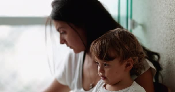 Mother Working Home Holding Baby Toddler Multi Tasking — Vídeo de stock