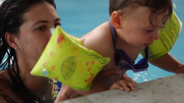 Mother Lifting Baby Toddler Out Water — Video