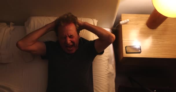 Tired Old Man Rubbing Eyes Fatigue Lying Bed Top View — Wideo stockowe