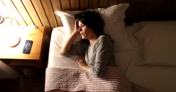 Woman Suffering Insomnia Turns Light Picks Cellphone — Wideo stockowe