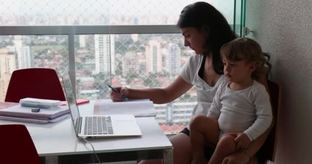 Mother Multi Tasking Home Parent Working While Holding Toddler Baby — Vídeos de Stock