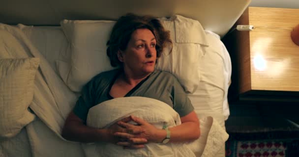 Senior Woman Lying Bed Night Turns Bedside Nightstand Light Going — Αρχείο Βίντεο