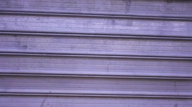 Garage gate closed, street store closed