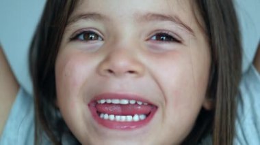 Excited happy little girl child. Joyful enthusiastic kid emotion