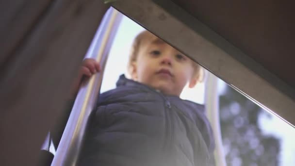 Active Little Toddler Boy Climbing Playground Staircase Sunlight — 图库视频影像