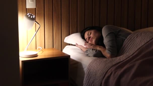 Woman Turning Bedside Lamp Middle Night Girl Gets Out Bed — Vídeos de Stock
