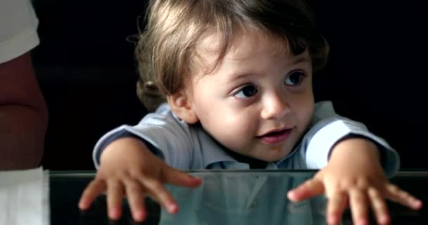 Cute Toddler Baby Boy Leaning Glass Table Hands Peeking Looks — Αρχείο Βίντεο