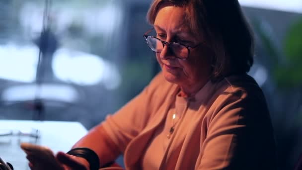 Candid Senior Woman Looking Cellphone Home Evening Older Lady Browsing — Stock videók