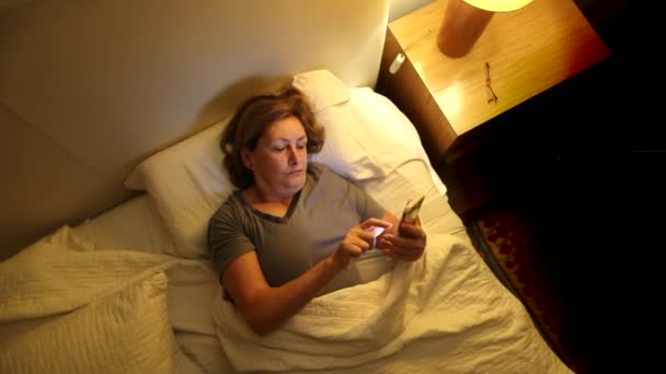 Woman Using Smartphone Sleep Night Person Preparing Sleep Turning Bedside — ストック動画