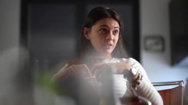 Candid woman in conversation at night talking