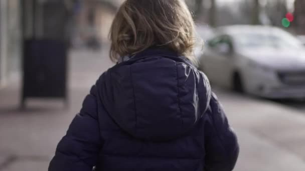 Toddler Boy Running City Winter Back Child Urban Sidewalk — Stockvideo