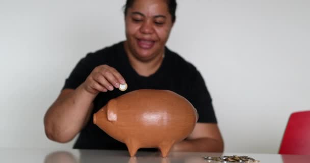 Black Woman Putting Coins Piggy Bank Saving Money Concept — Vídeo de Stock