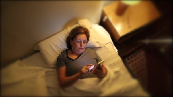 Senior Woman Picking Cellphone Night Bed — Video