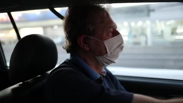 Older Man Driving Car While Wearing Covid Face Mask — Αρχείο Βίντεο