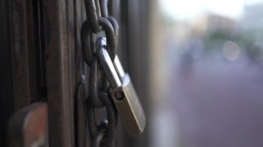 Store front gate closed, close-up lock