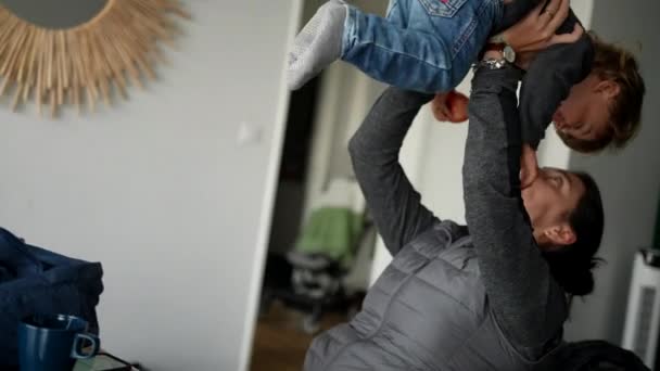 Toddler Jumping Mother Arms Parent Lifting Two Year Old Baby — Stockvideo