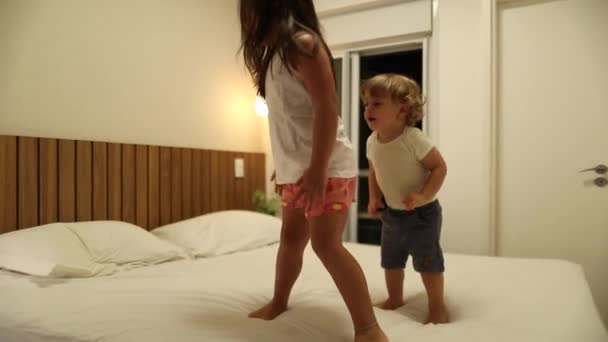 Children Jumping Bed Night Happy Little Brother Sister Jump — Wideo stockowe