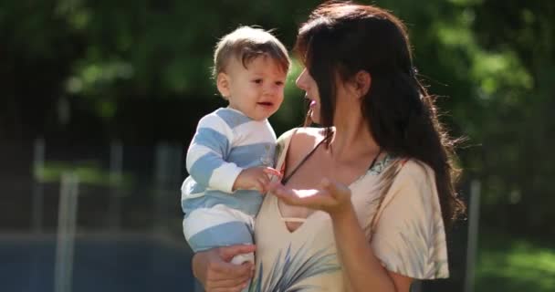 Candid Mom Holding Baby Son Arms Nature — Stock Video
