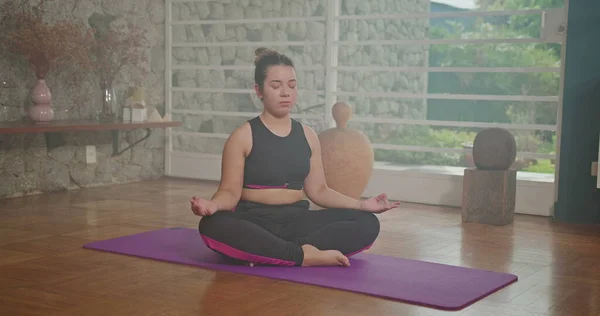 Young Woman Meditates Sitting Map Her Living Room Girl Practicing — 图库照片