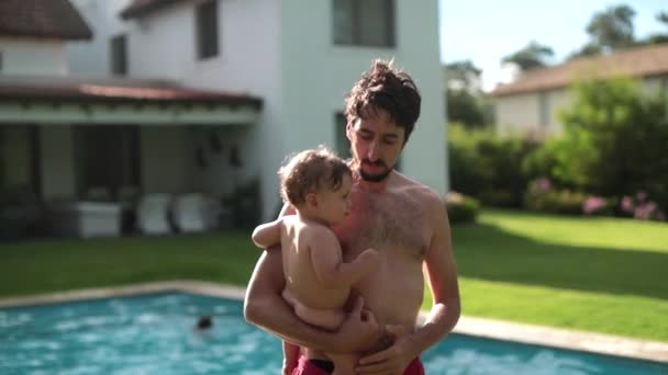 Young Father Holding Baby Son Home Backyard Sunny Day Outdoors — Wideo stockowe