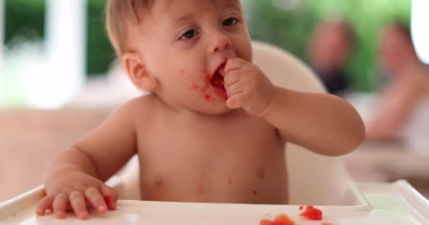 Cute Messy Baby Eating Himself Shirtless Toddler Infant Eating Food — Stock Video