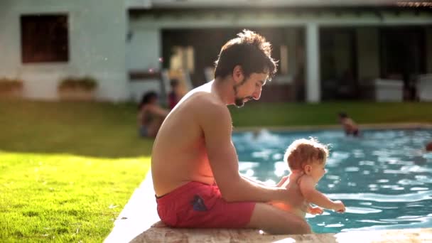 Father Holding Toddler Baby Outdoor Swimming Pool — Vídeo de Stock