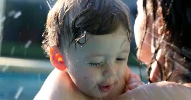 Happy Excited Baby Splashing Water Swimming Pool — стоковое видео